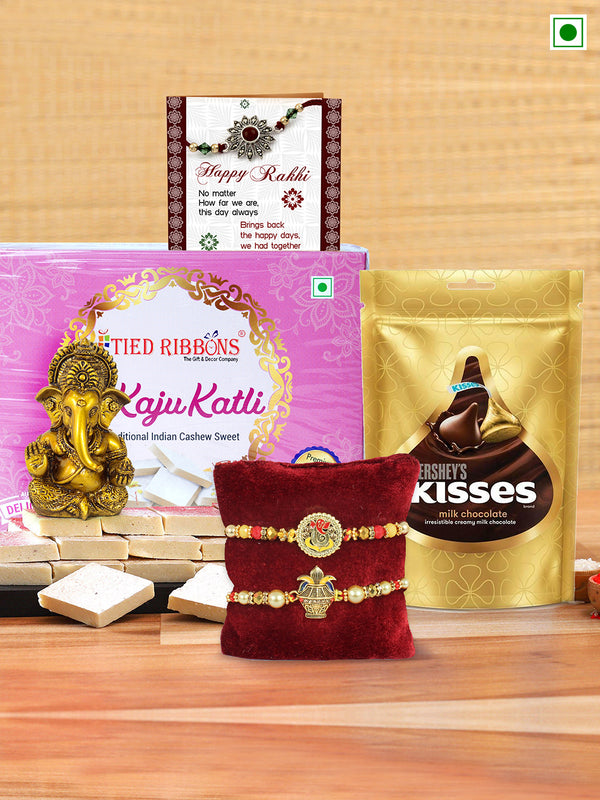 Set of 2 Brother Rakhi with Sweets, Chocolate and Ganesha Idol Combo