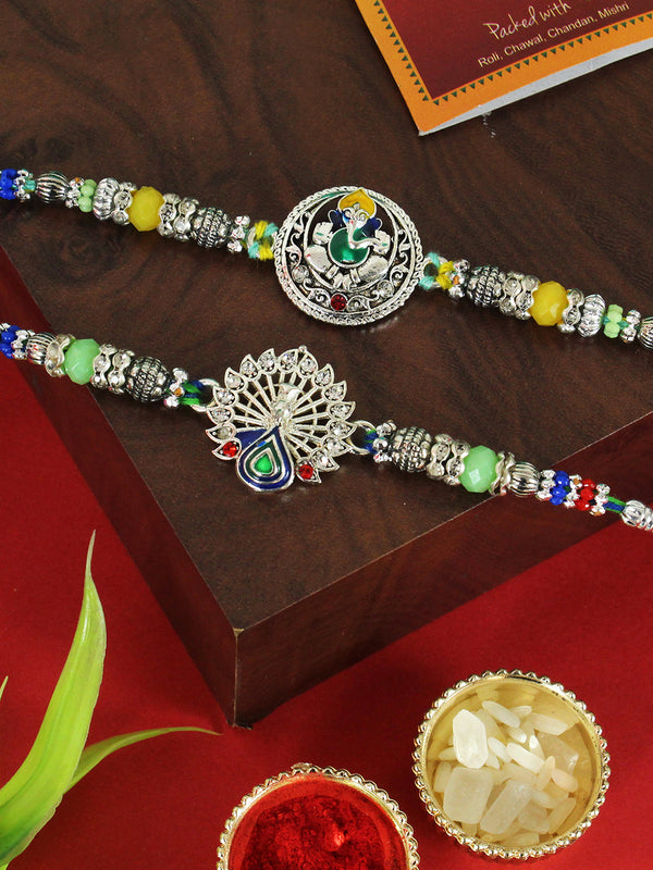 Rakshabandhan Set of 2 Silver (Ganesha & Peacock) Rakhi | Rakhi Wishes Card | Roli Chawal Tika
