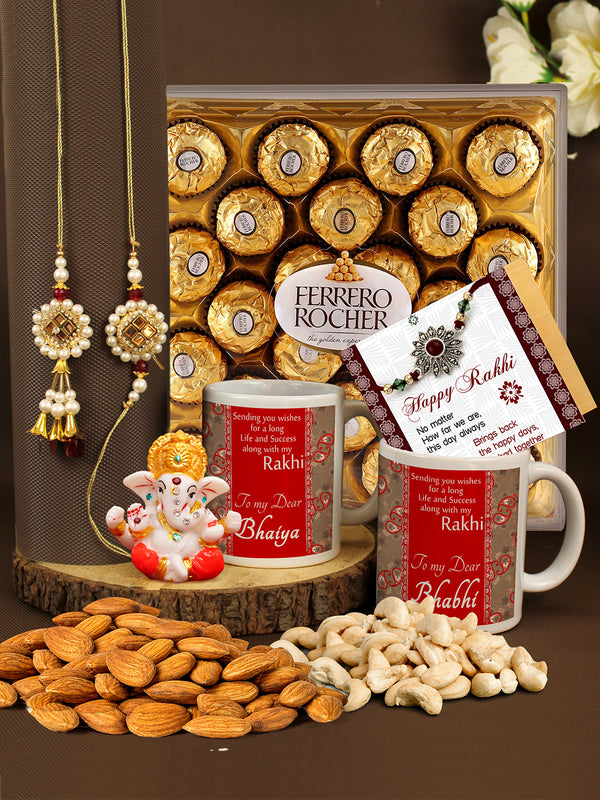 Rakhi for Brother and Bhabhi and Kids with Chocolat Gift Pack- Premium Lumba Rakhi Pack of 2 Coffee Mugs, Dry Fruits Almonds Cashew and Mini Ganesh Idol