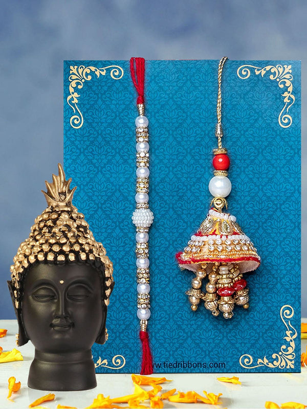 White & Black Bhaiya Bhabhi Lumba Rakhi with Buddha Idol Gift Pack