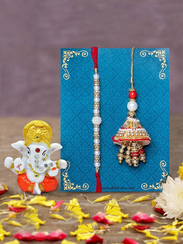 Red & White Bhaiya Bhabhi Lumba Rakhi with Ganesha Idol Combo Gift Set