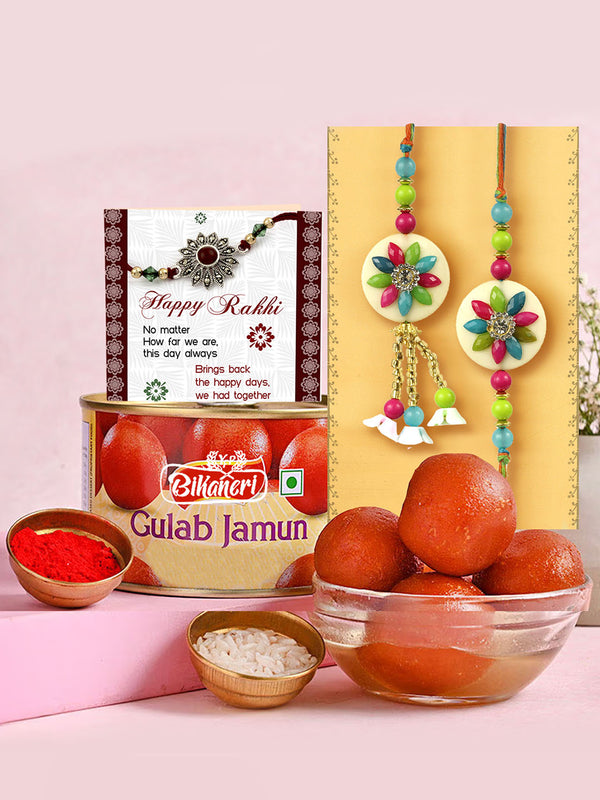 Rakhi for Brother and Bhabhi with Sweets - Premium Lumba Rakhi Set for Bhaiya Bhabhi with Gulab Jamun Box, Card and Tikka Hamper