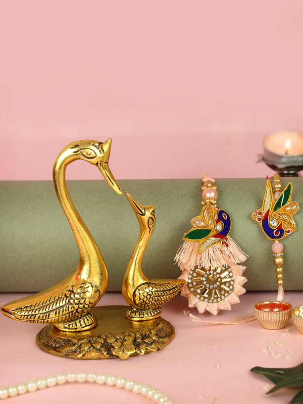 Rakhi for Brother and Bhabhi with Gift Set Swan Figurine and Mini Card